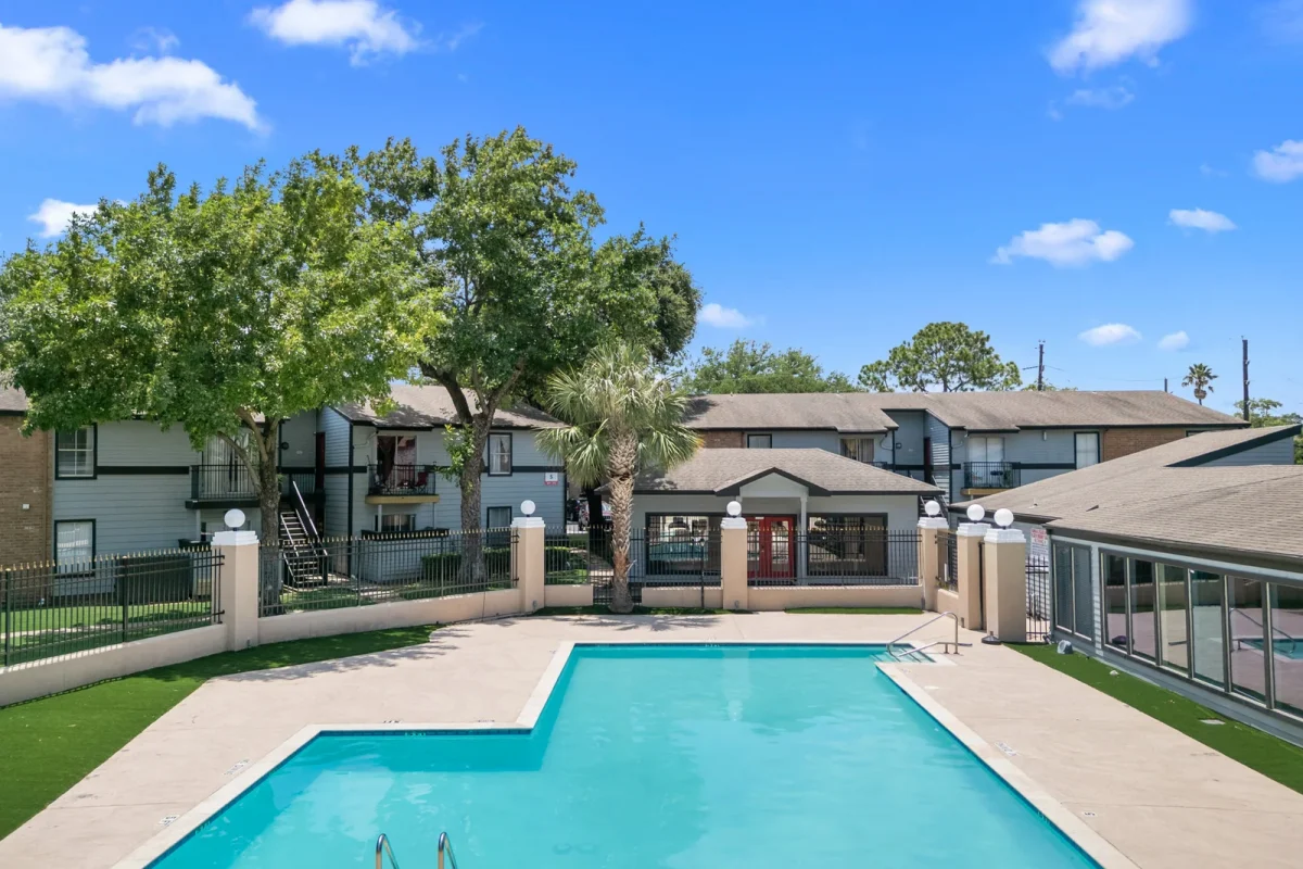 Renovated swimming pool at Falls of Gessner apartments in Houston